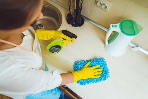 Commercial office cleaning tasks including desks and communal areas