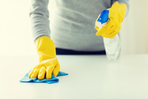 Detailed builders clean of kitchen surfaces and fittings in SW20